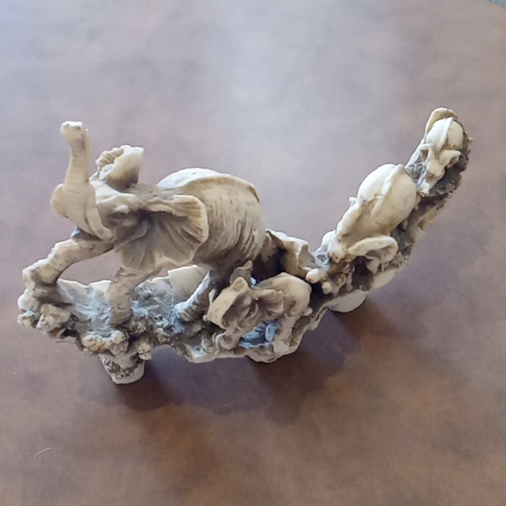 Elephant family carved from soap stone
